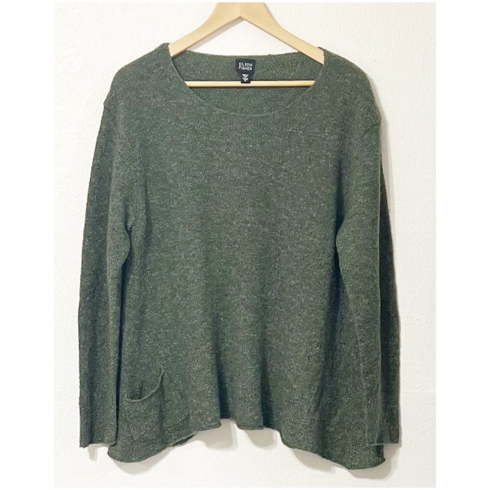 Eileen Fisher crew neck sweater with an asymmetric hem and a small front pocket